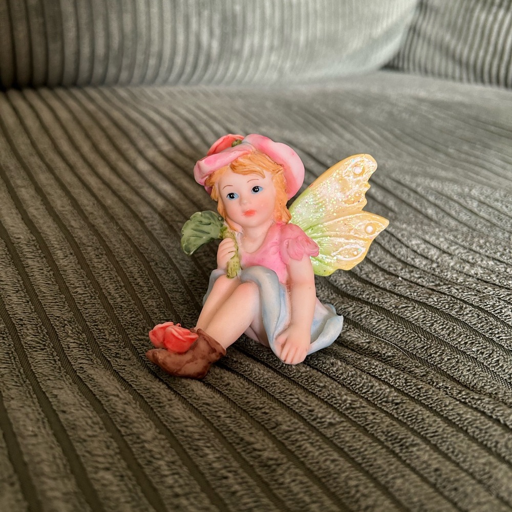 Charming Fairy Figurine with Pink and Green Accents